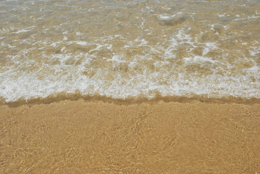 photo of ocean's water on a beautiful beach