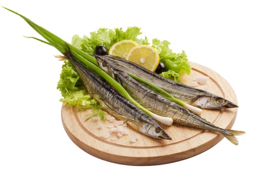 A composition with smoked saira fish (cololabis saira) on wooden plate isolated on white