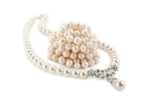 Pendant on pearl chain. Isolated on light background