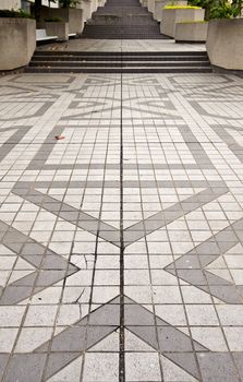 Tiles and step with geometric patterns in gray