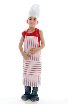 A young chef standing and pondering.  Standing on a white background.