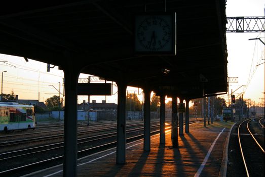 Railway station lightened by the sunrise