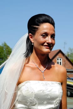 Happy bride in a white dress