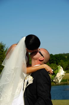 Bride and groom are kissing