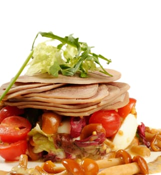 Smoked tongue served with muchrooms and tomatos isolated on white