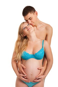 Pregnant woman with her husband just happy together. Studio shoot on white.
