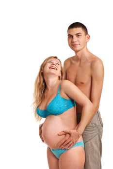 Pregnant woman with her husband just happy. Studio shoot on white.