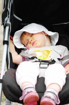 sleeping baby into baby carriage