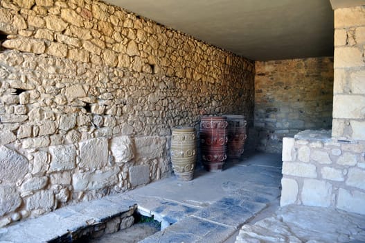 Travel photography: Ancient ruins: vases at the Knossos Palace in Crete, Greece