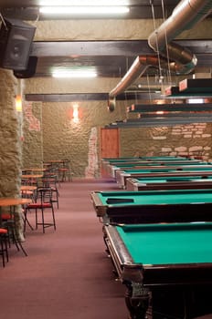 Shot of billiard room with tables, interior