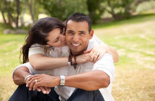 Affectionate Happy Hispanic Couple in the Park.