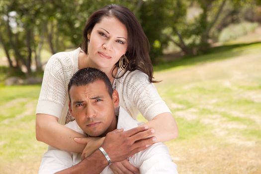 Affectionate Happy Hispanic Couple in the Park.