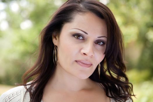 Attractive Hispanic Woman Portrait in the Park.