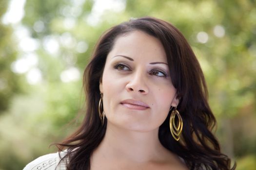 Attractive Hispanic Woman Portrait in the Park.