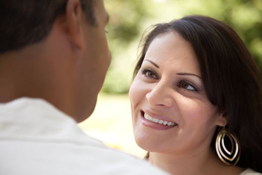 Affectionate Happy Hispanic Couple in the Park.