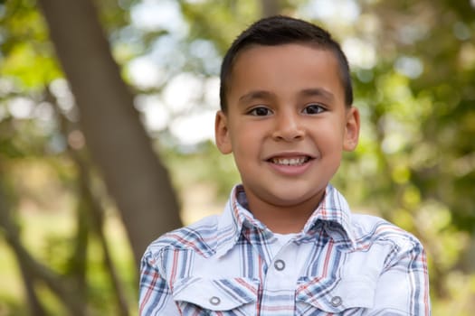 Handsome Young Hispanic Boy Having Fun in the Park.