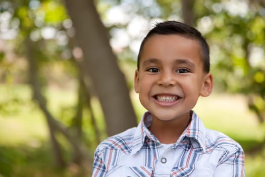 Handsome Young Hispanic Boy Having Fun in the Park.