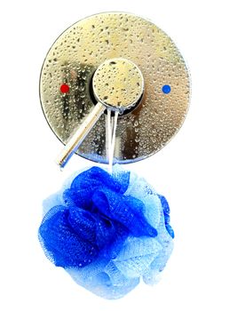 Isolation of a shower temperature control valve and hanging bath puff over a white background