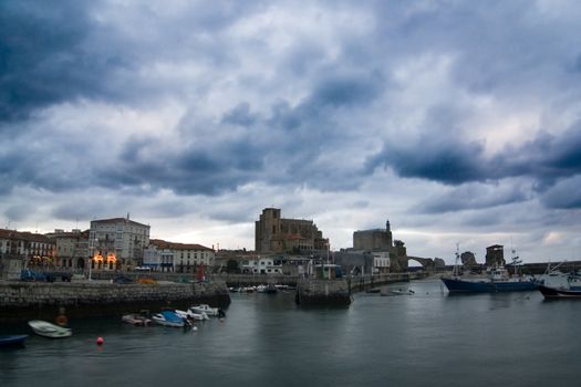 Boats in the harbour near the city