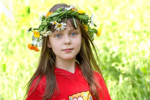 The girl with blue eyes in a wreath 