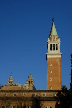 The bell tower of the church of San Giorgio Maggiore, Venice, in the early morning light