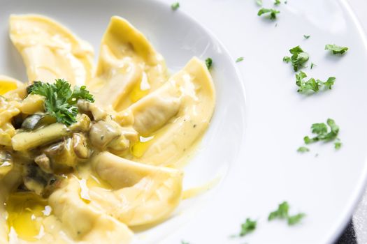 Fresh pasta with a sauce made of mushrooms, chopped into tiiny pieces, cream and wine