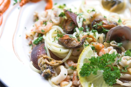 Delicious seafood pasta dish with spaghetti, mussels and shrimp