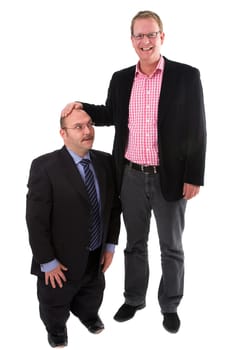 Two businessman standing on white background while one is putting his hand on the smaller man's head