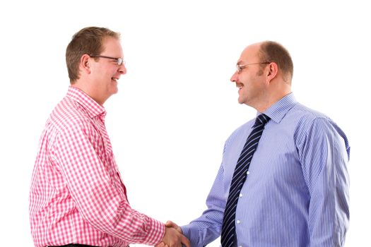 Two businessman shaking eachother the hand after a successful meeting