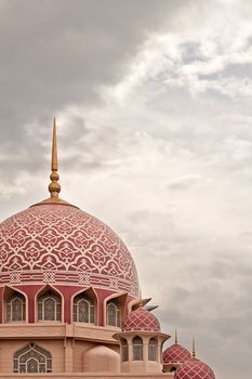 Architecture of pink dome mosque in Putrajaya, Malaysia. Asia.