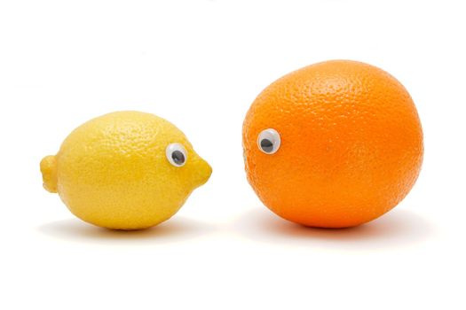 Funny lemon and orange with eyes isolated