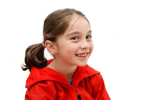 Smiling seven years girl with pigtails