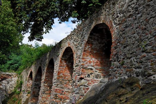 Red brick arches of medieval castle in Schallaburg, Austria