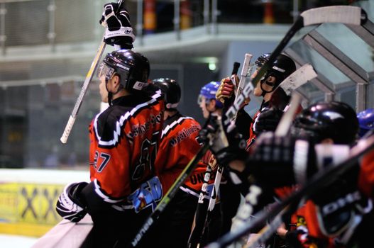 ZELL AM SEE, AUSTRIA - FEB 13: Salzburg hockey League. Schuttdorf bench celebrating goal. Game SV Schuttdorf vs HCS Morzg  (Result 9-3) on February 13, 2011 at the hockey rink of Zell am See