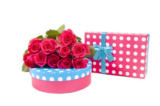two giftboxes with pink roses isolated on white