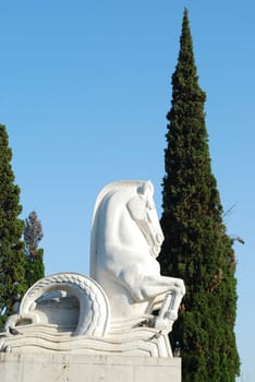 photo of a sculpture statue of horses in a park in Lisbon