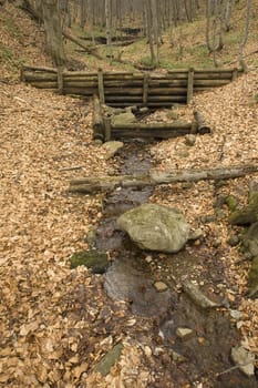 Nature scenery, small river with several wooden dams