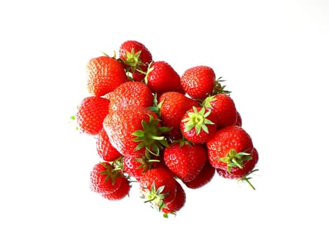 pile of strawberries placed on a mirror 