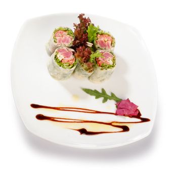 Image of sushi decorated with lettuce. File includes clipping path for easy background removing