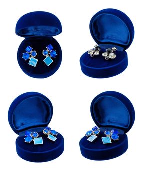 Earring in blue present box top view isolated