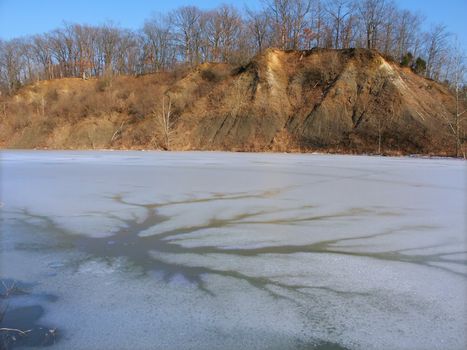 View of ice-covered Emerald Pond at Kickapoo State Park - Illinois.