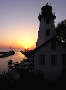 Kincardine Lighting House, a local landmark and historical building on sun set. 
