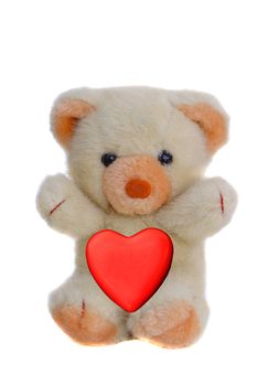 A beautiful teddy bear with red heart a symbol of peace and love 