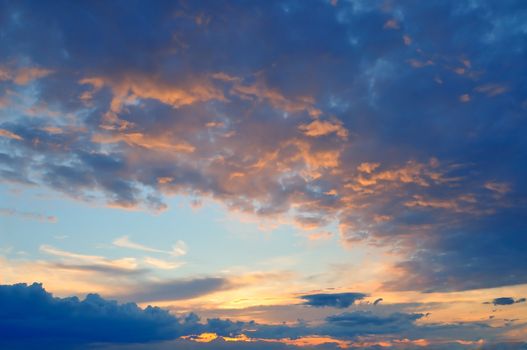 Dramatic sunset under the clouds in spring