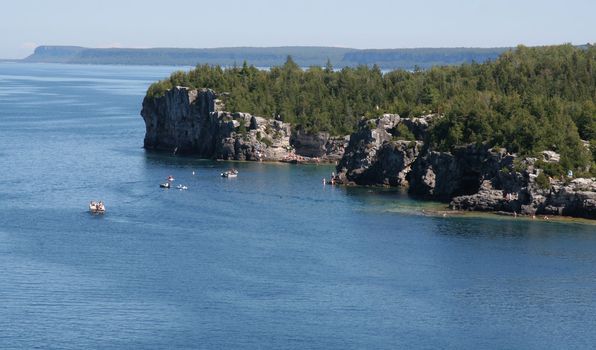 The 'Grotto' from a distance in Georgian Bay in  Bruce Penisula National Park in Ontario, Canada.  

