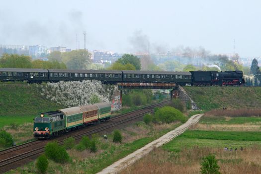 Two levels crossing of the steam and diesel hauled trains