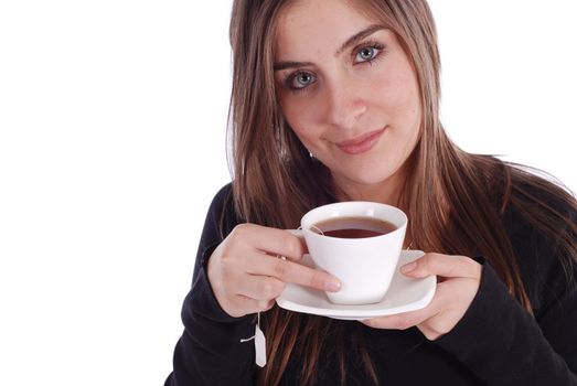 Beautiful woman holding tea cup and saucer on a white background