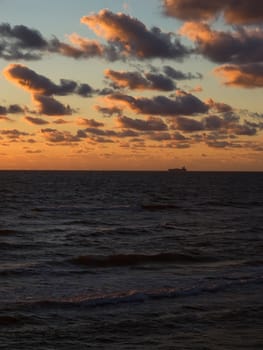 sea sunset baltic sun sky coast clouds