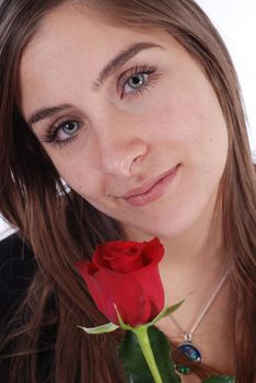 Beautiful girl holding a rose on white background