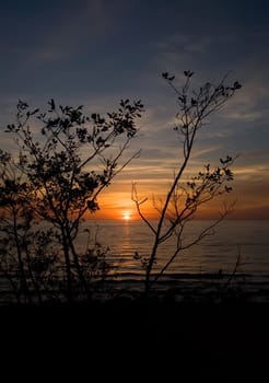 sea sunset baltic sun sky coast clouds